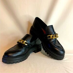 Black Leather Loafers with Gold Chain Accent
